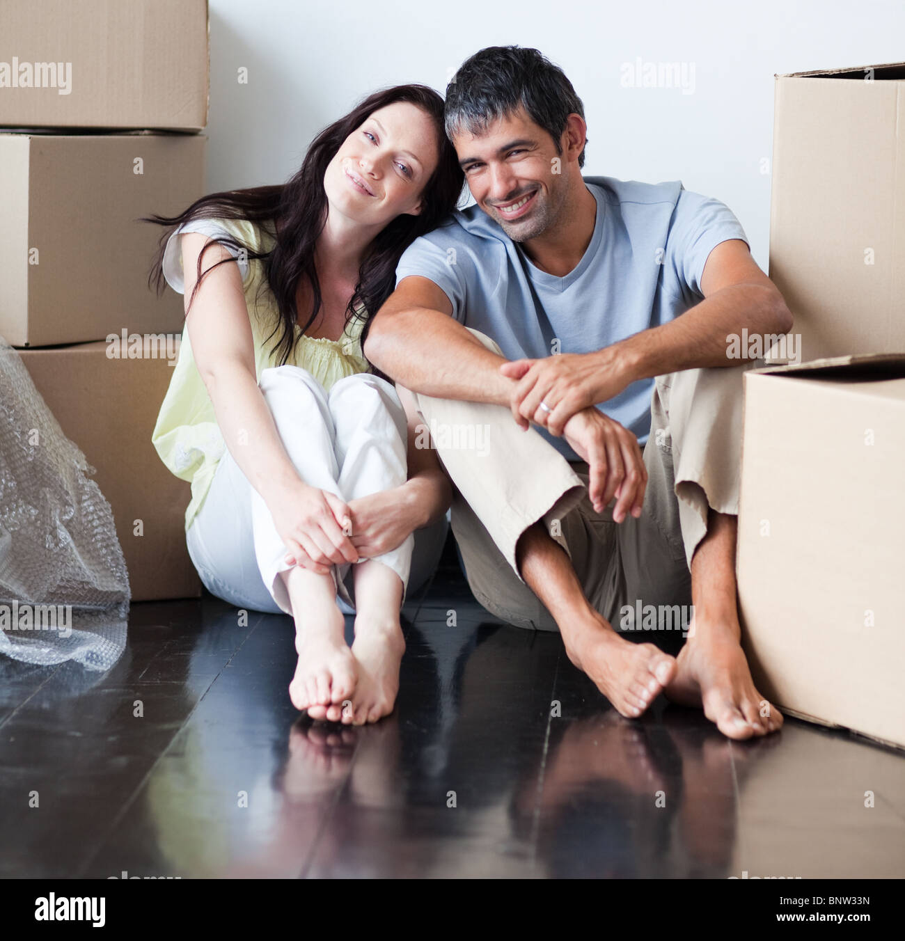 Happy couple in their new house Stock Photo - Alamy