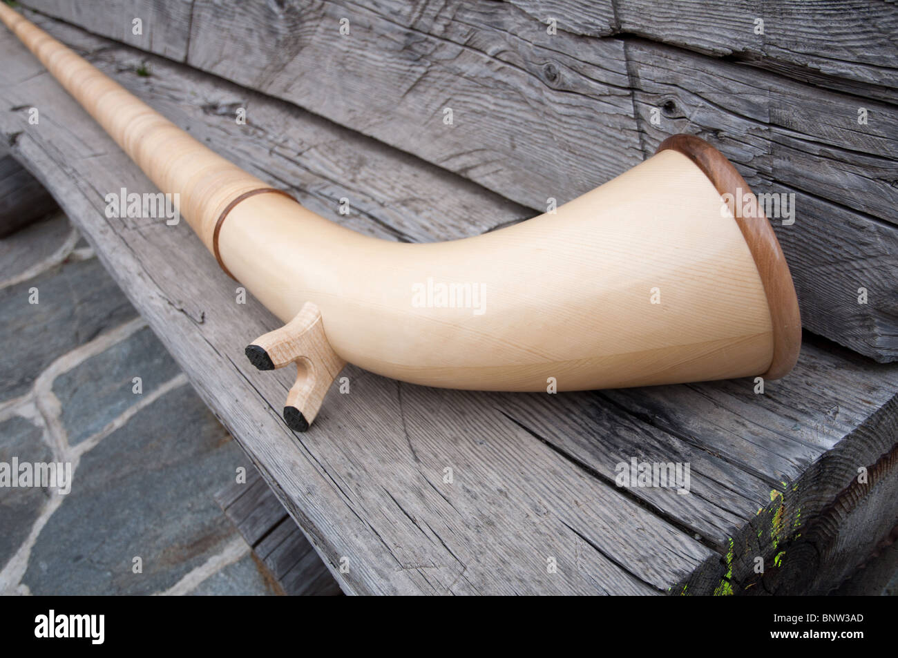 Alp horn traditional alpine wind instrument Stock Photo