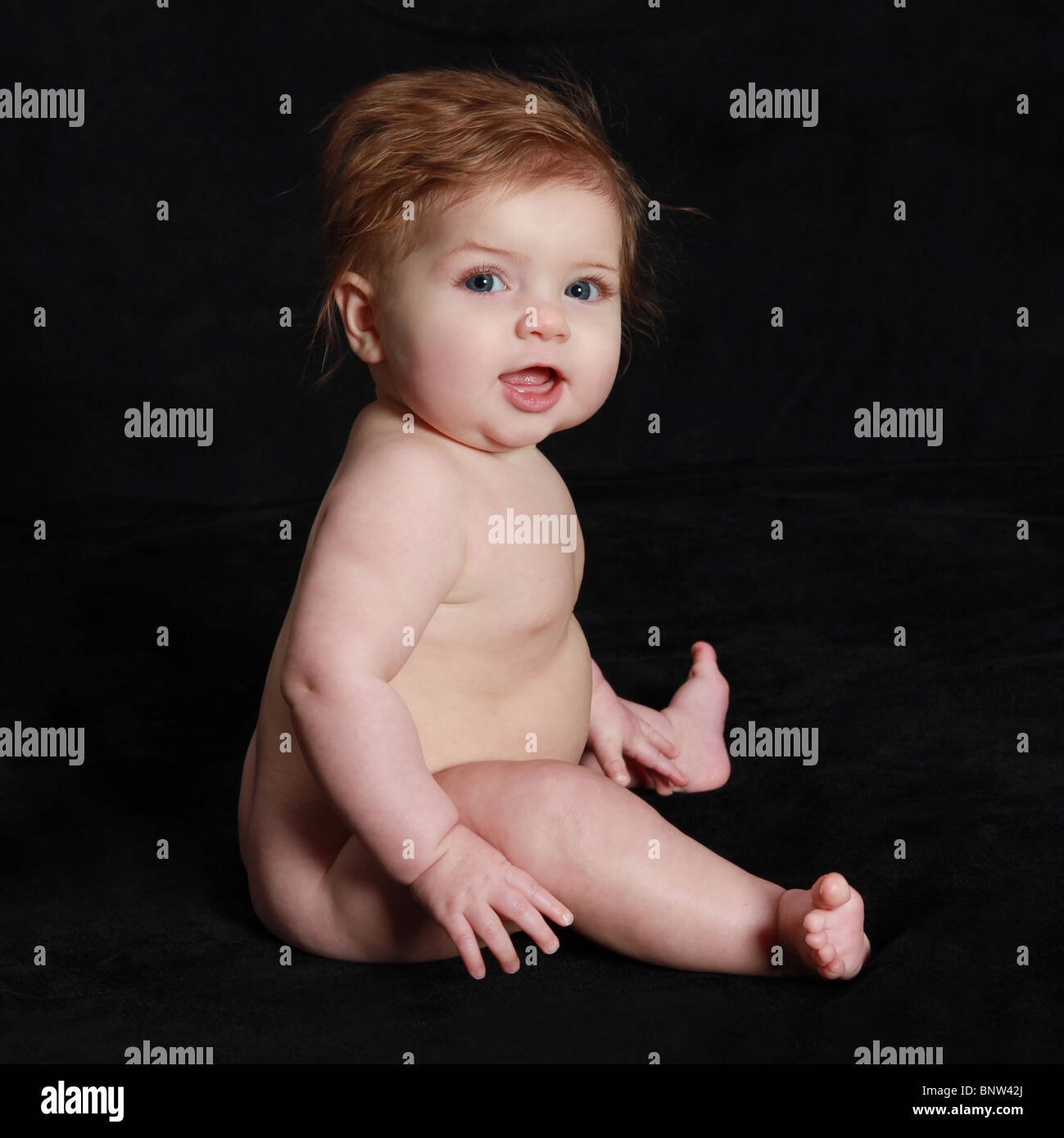 Baby Chubby Red Hair Blue Eyes Sitting Stock Photo Alamy