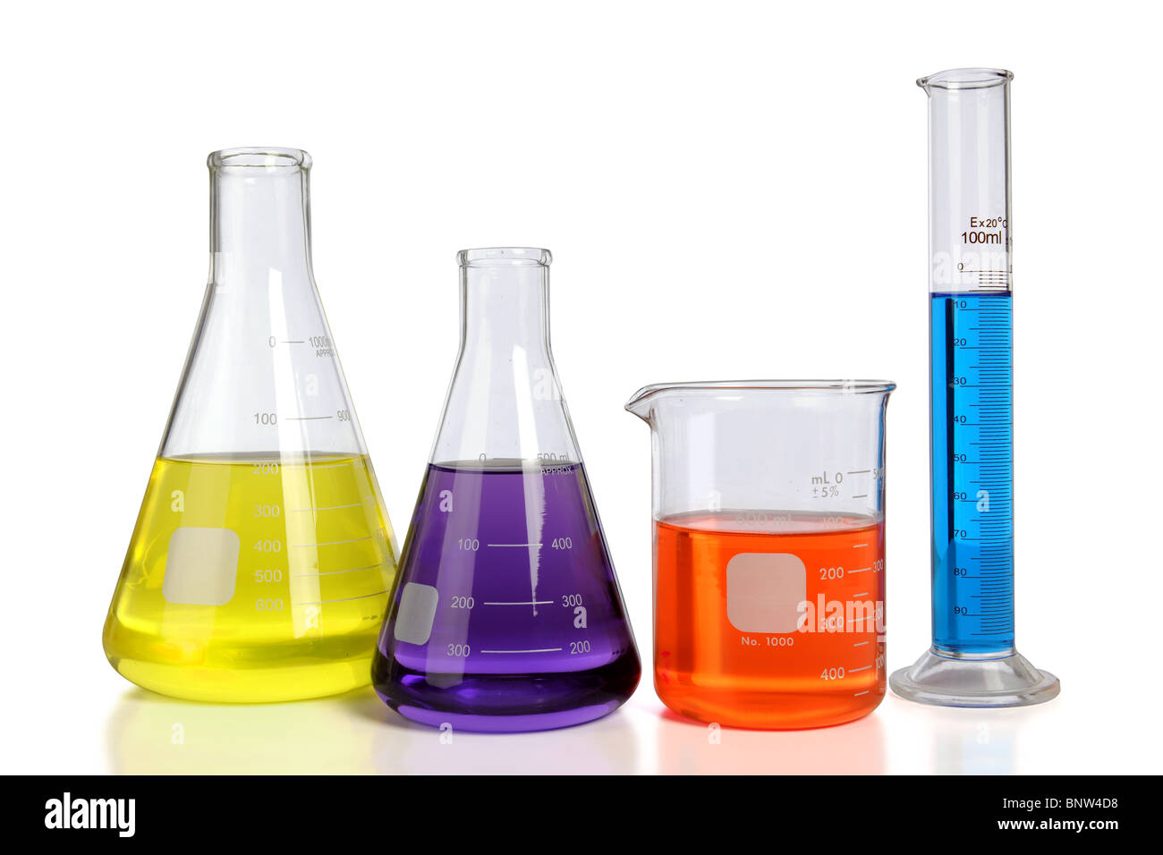 Laboratory glassware over white background with table reflections ...