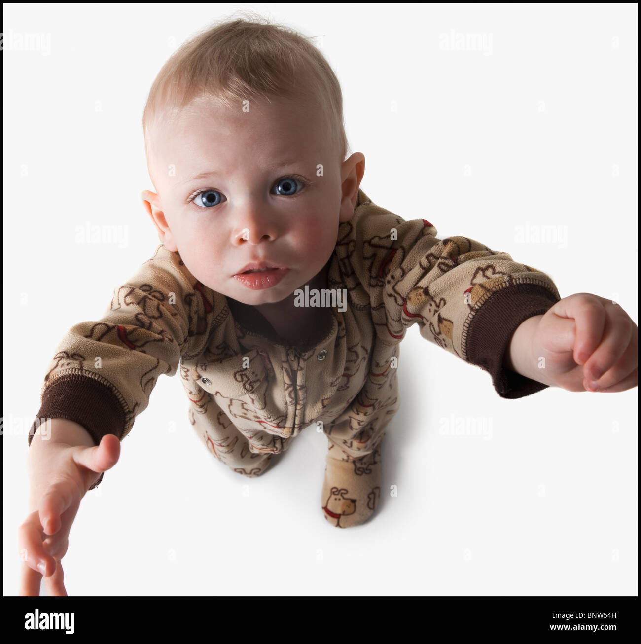 Baby reaching up Stock Photo - Alamy