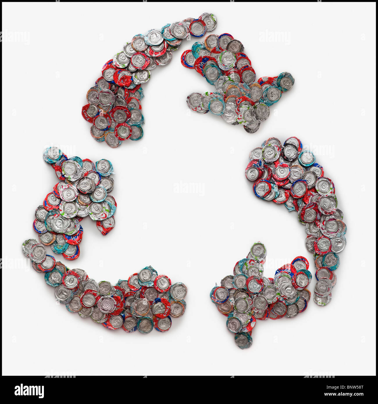 Crushed can arranged in the shape of recycle symbol Stock Photo Alamy