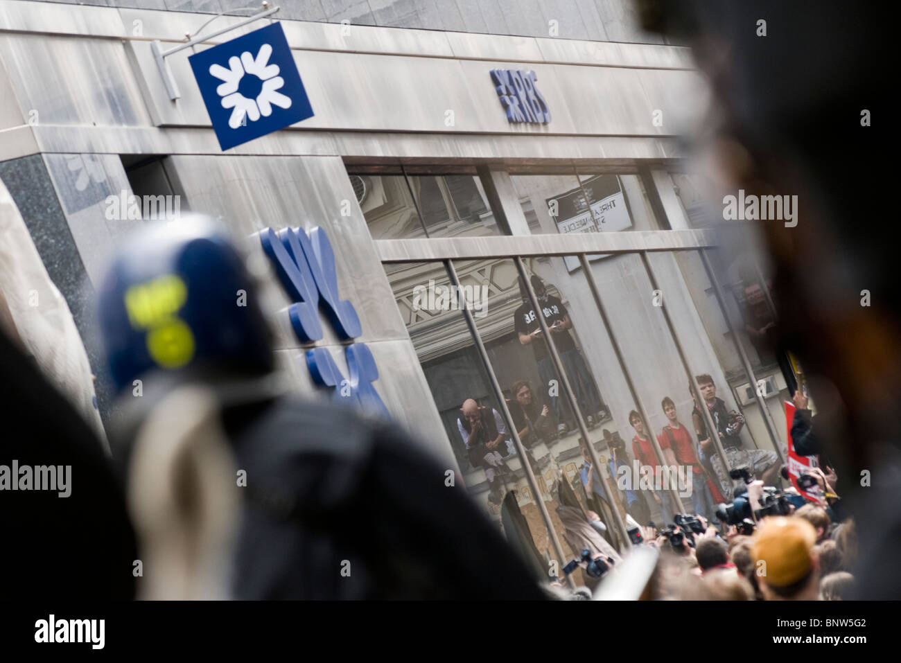 Financial fools day in the City.  Protestors take to the streets and riot police are deployed near the Bank of England Stock Photo