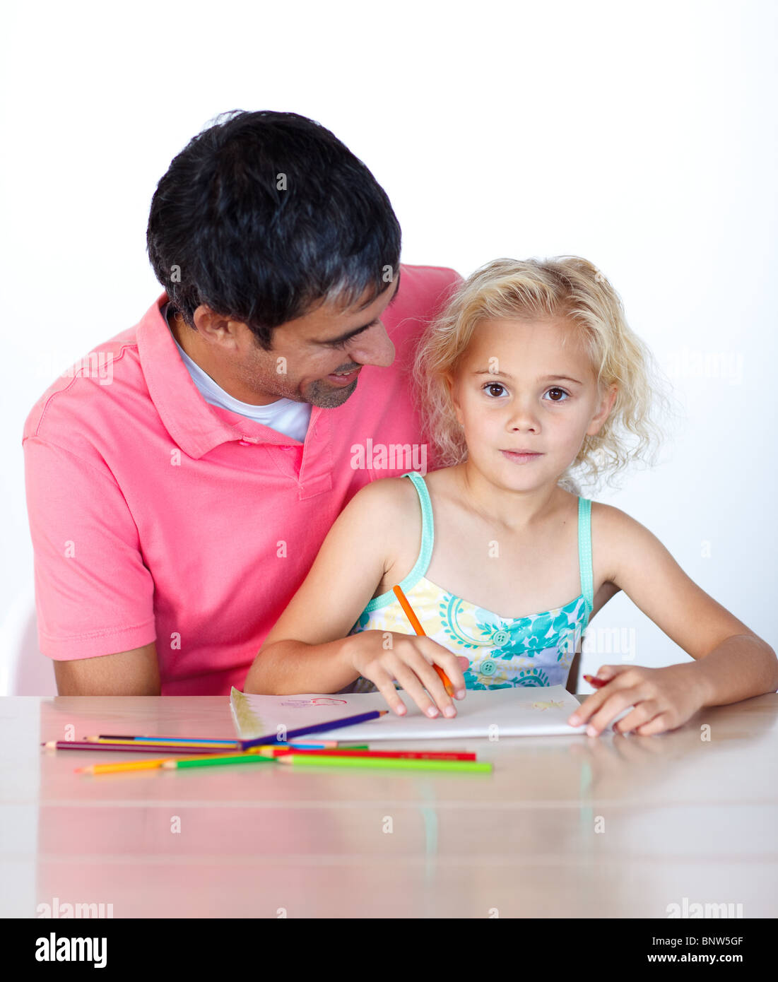 Beautiful daughter painting with her dad Stock Photo - Alamy