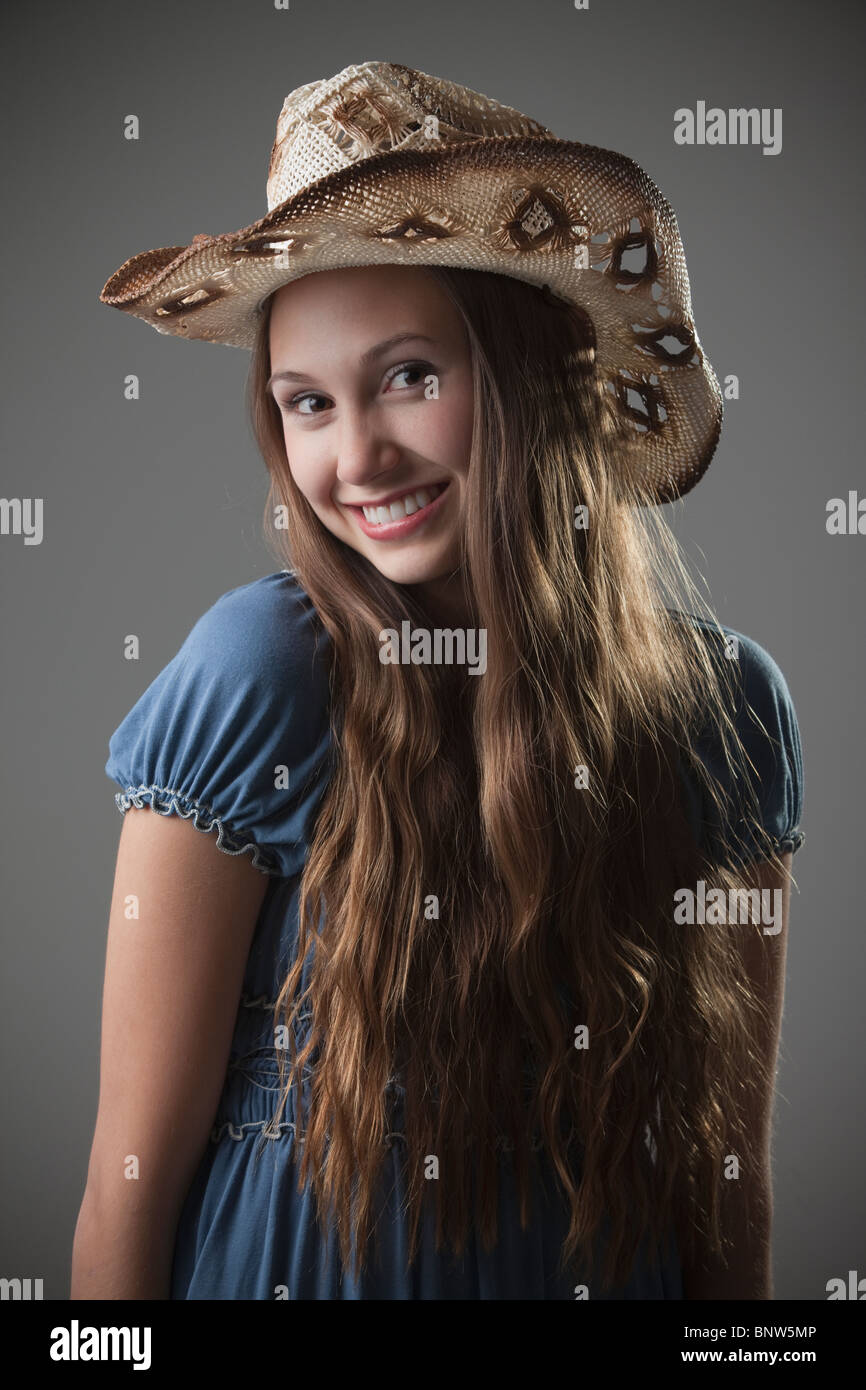 Beautiful long haired cowgirl Stock Photo