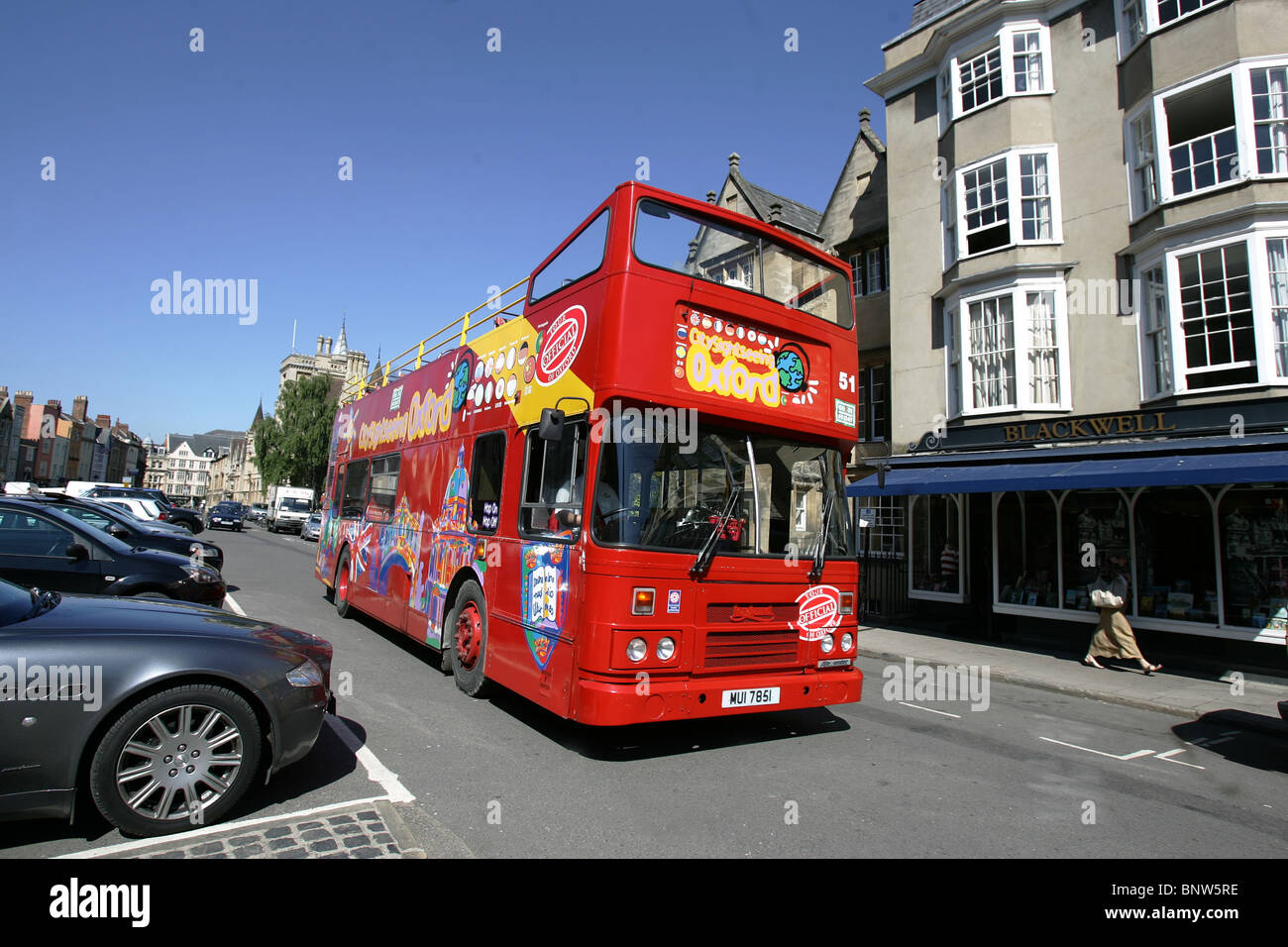 An Oxford Tour Bus passes the famous Blackwell bookshop in Oxford. Stock Photo