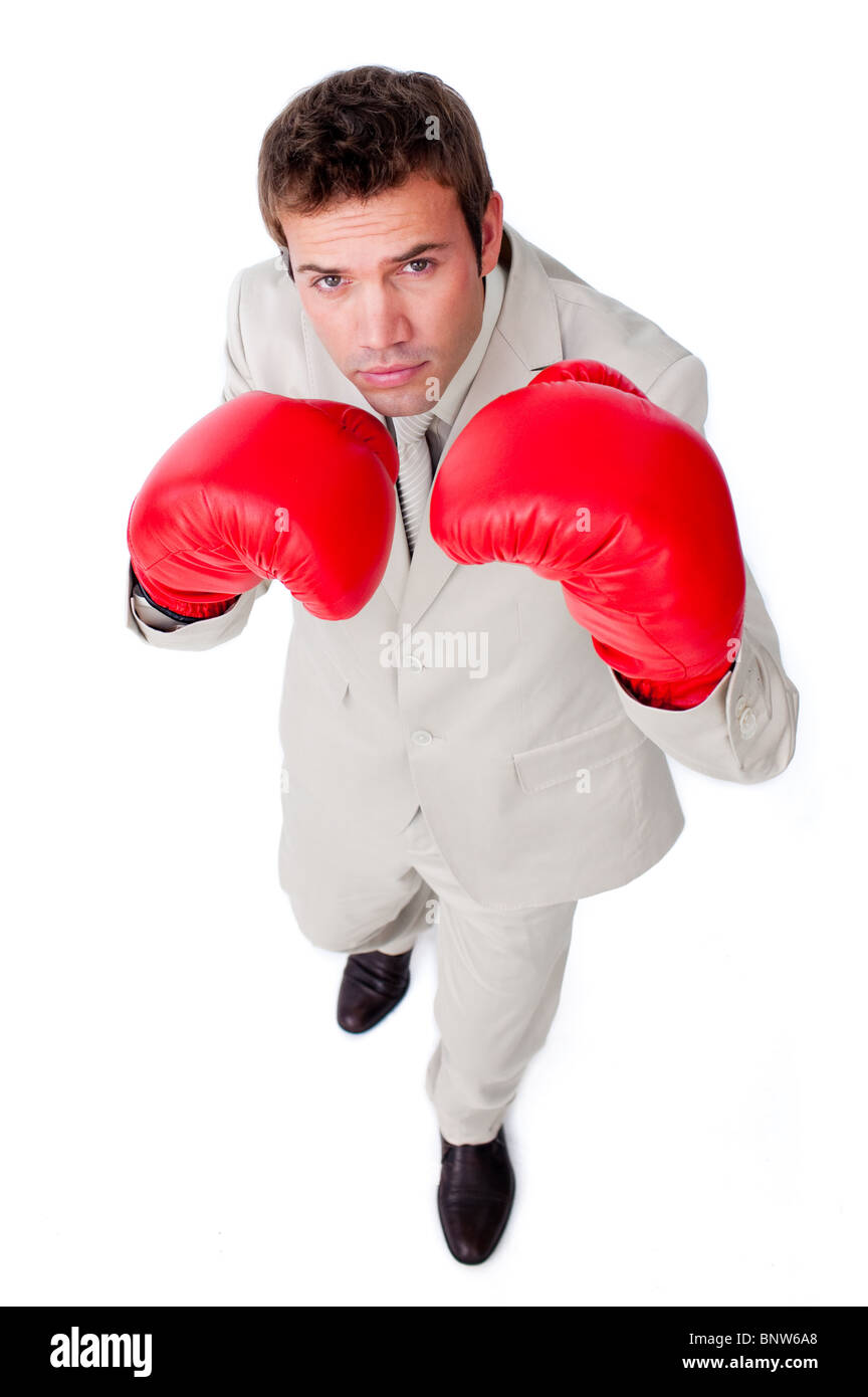 Businessman wearing boxing gloves Stock Photo Alamy