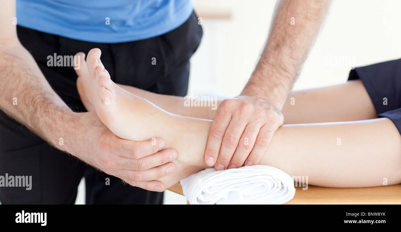 Young woman enjoying a foot massage Stock Photo