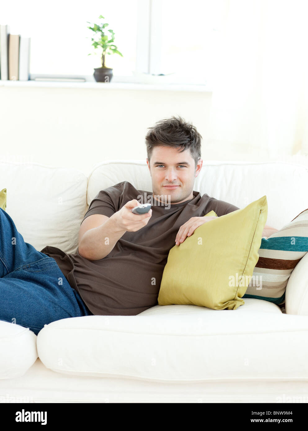 Smiling man is relaxing Stock Photo