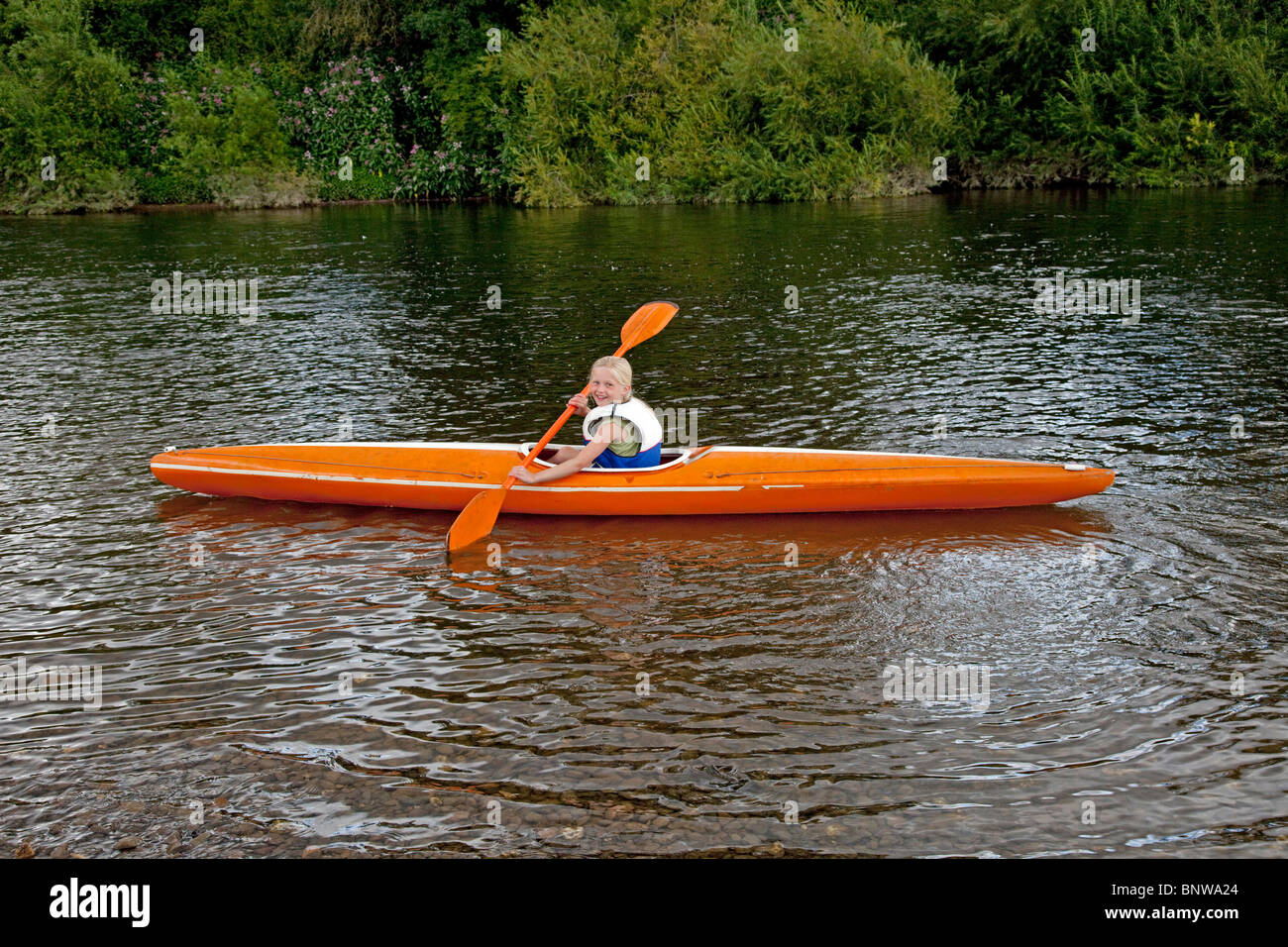 Orange canoe hi-res stock photography and images - Alamy