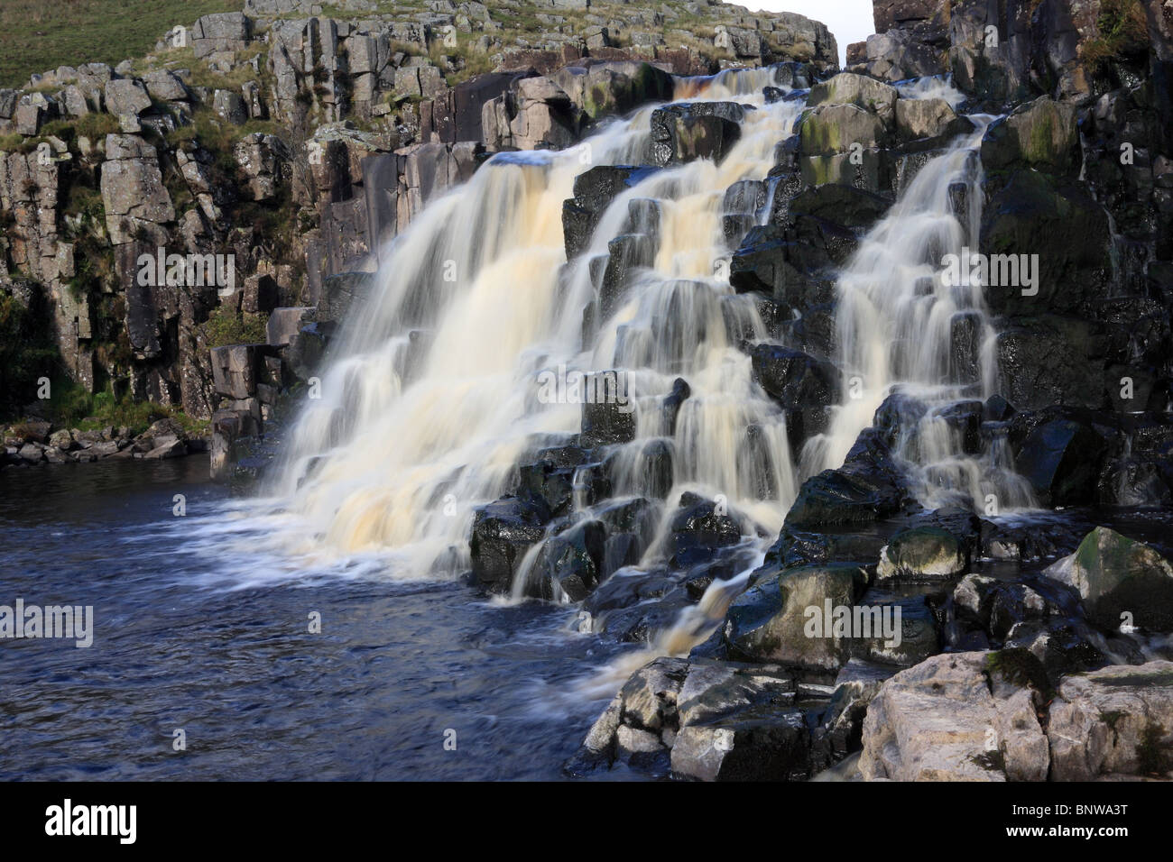 The River Tees Flowing over the Lower Waterfall of Cauldron Snout Upper Teesdale County Durham Stock Photo