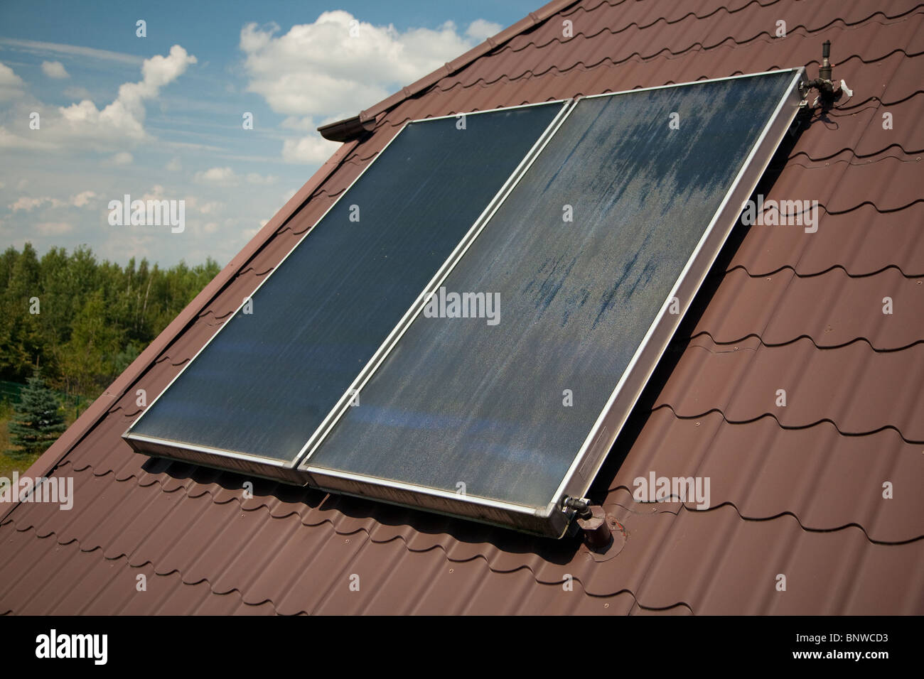 Flatplate solar collector on roof in summer Stock Photo Alamy