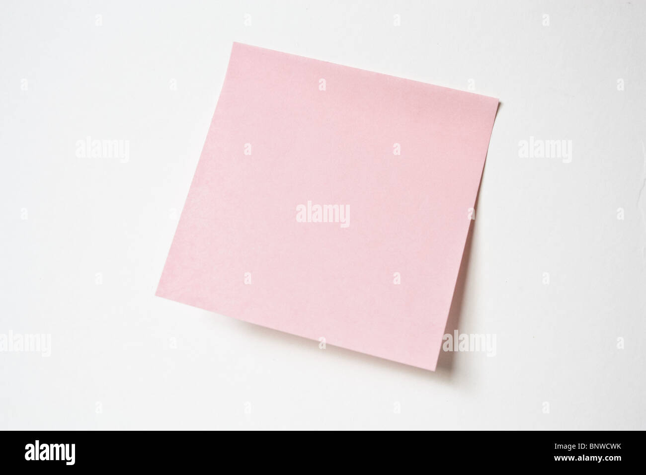 pink postit post-it note memo office Stock Photo