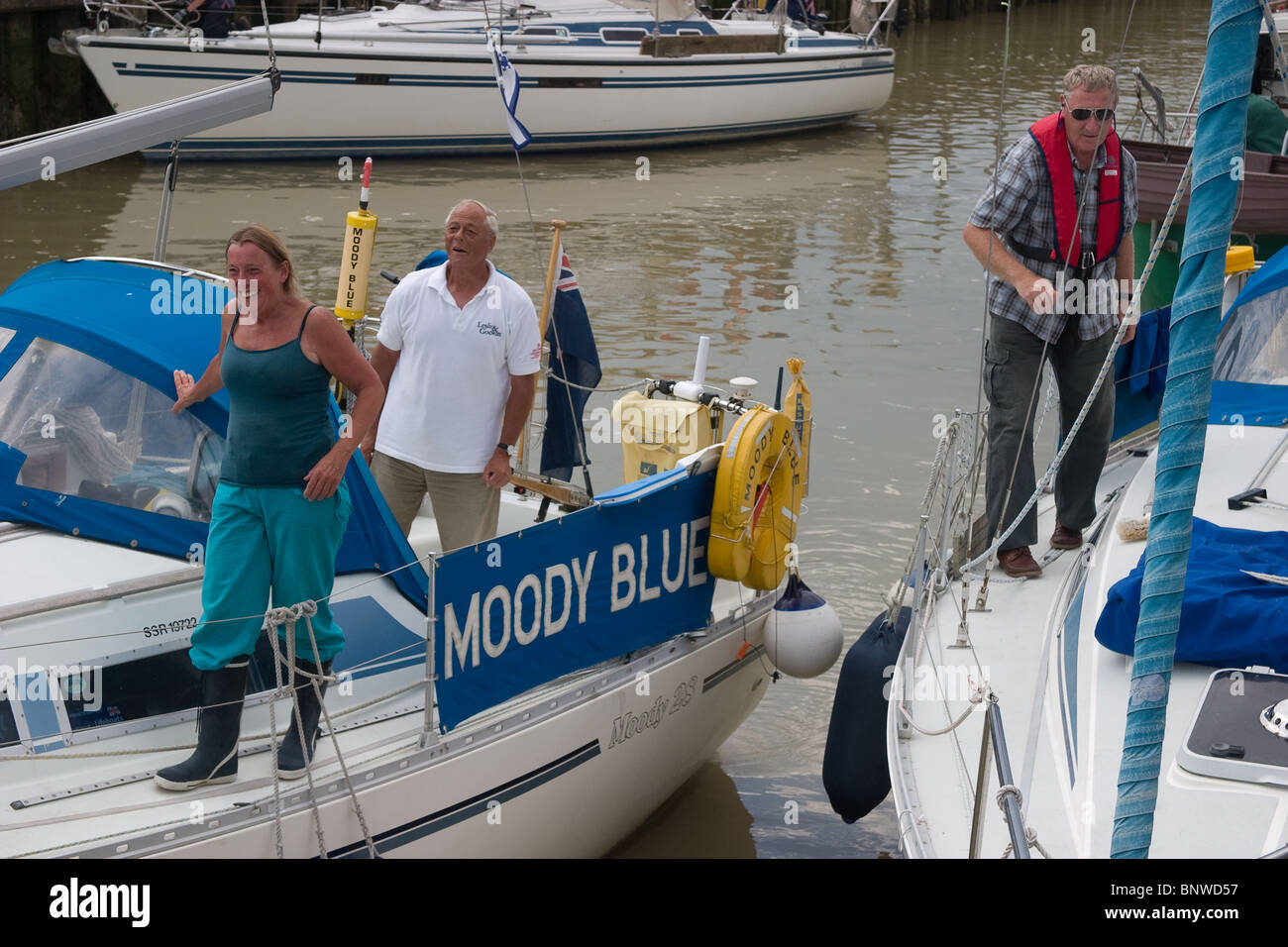 tied double berthed sailing boat sailors smiling Stock Photo - Alamy
