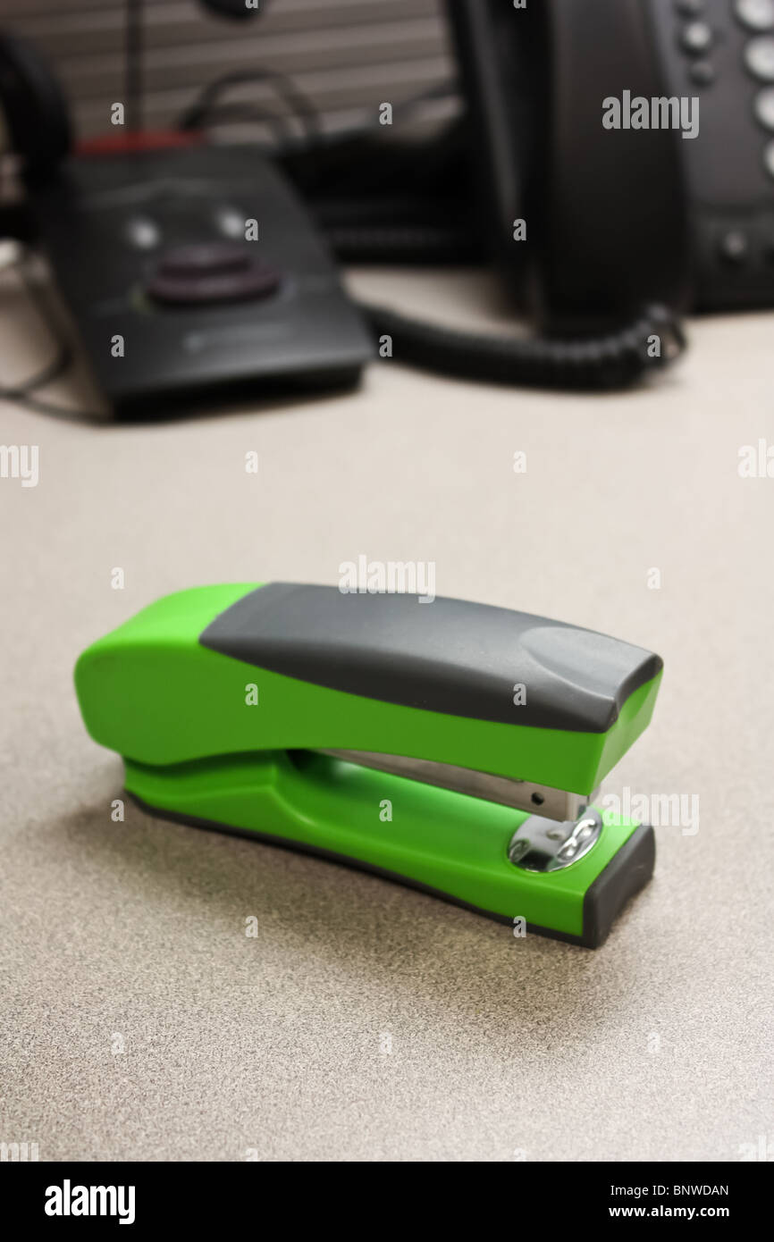 green stapler office desk Stock Photo Alamy
