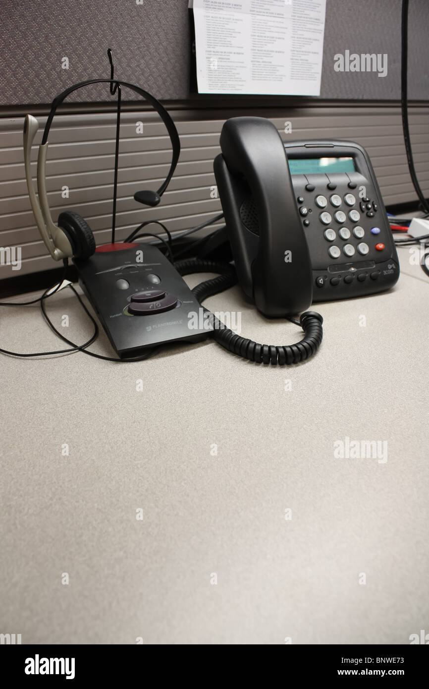 phone headset office desk Stock Photo
