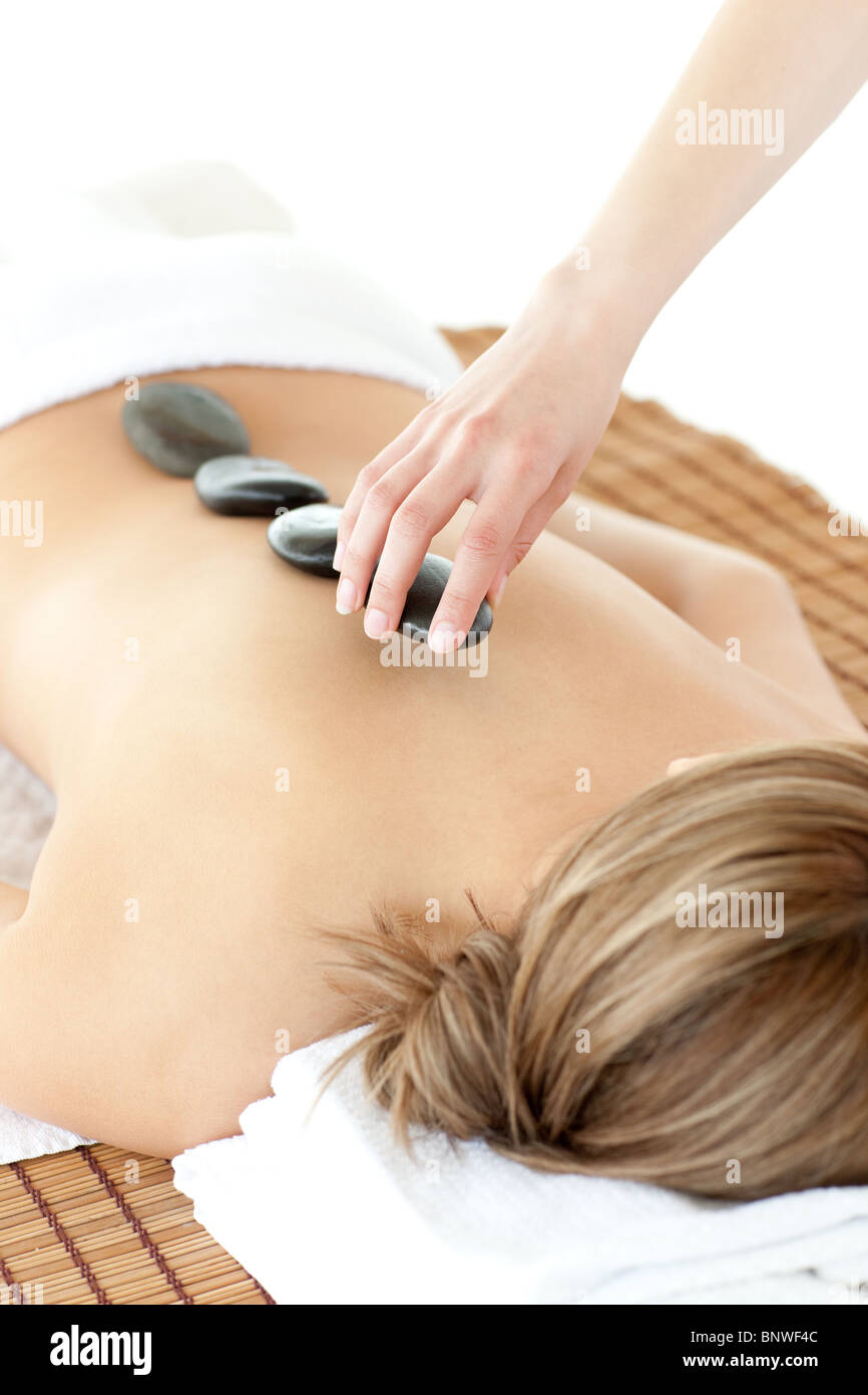 Woman lying on a massage table Stock Photo