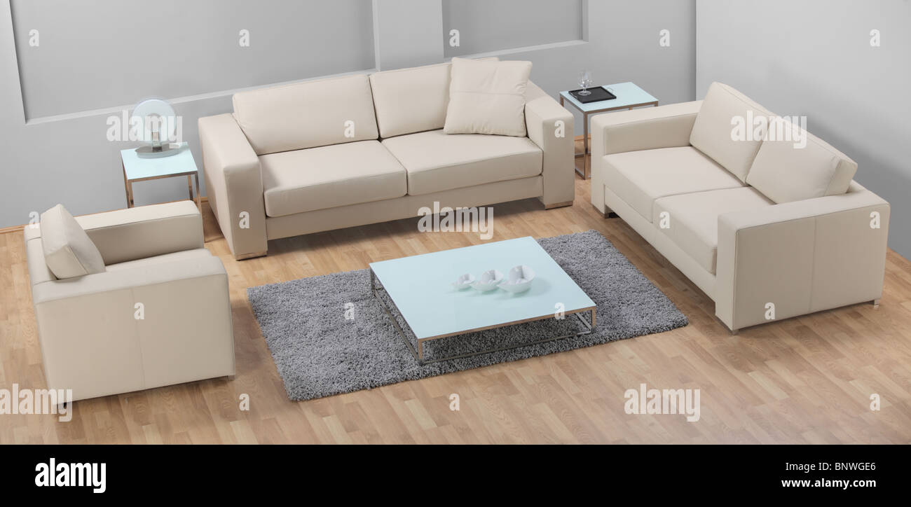 A view of modern leather white sofa Stock Photo - Alamy
