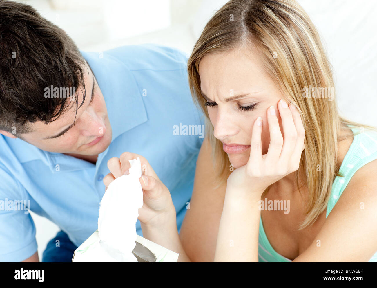 Angry couple having an argue in the living-room Stock Photo