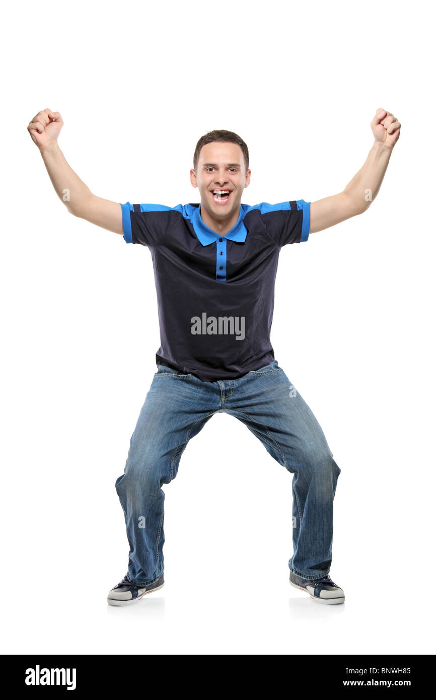 Excited football fan watching sport Stock Photo