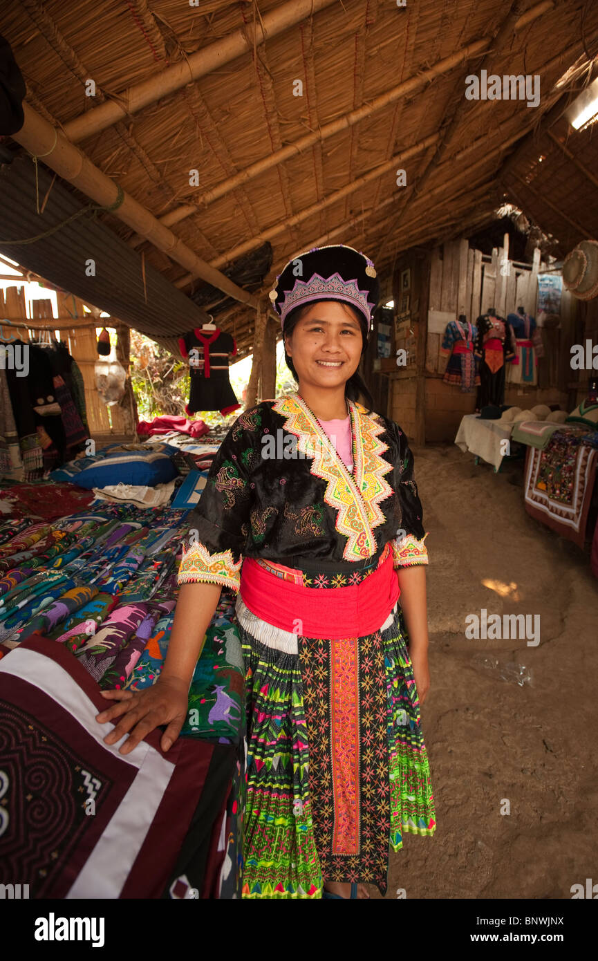Woman selling textiles in a small village in the Mae Rim District, Chiang Mai Province, Thailand, Asia Stock Photo