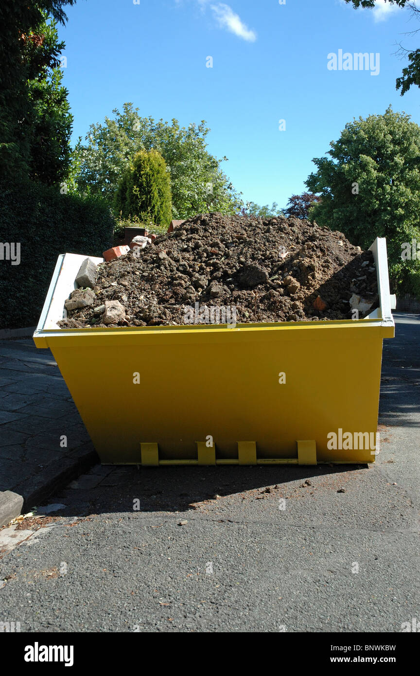 Skip on the road Stock Photo Alamy
