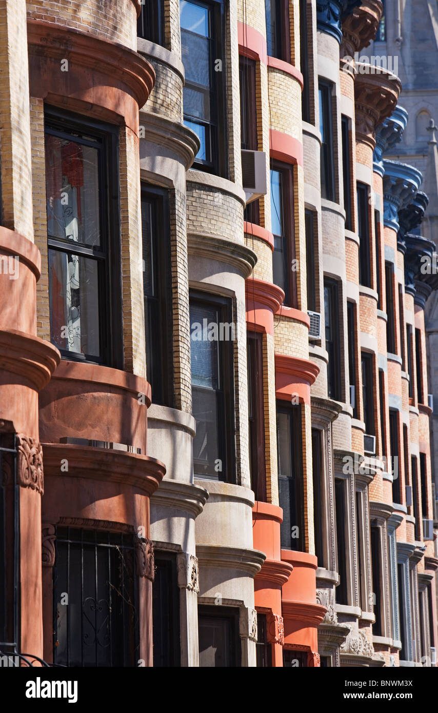 Windows on brownstone buildings Stock Photo - Alamy