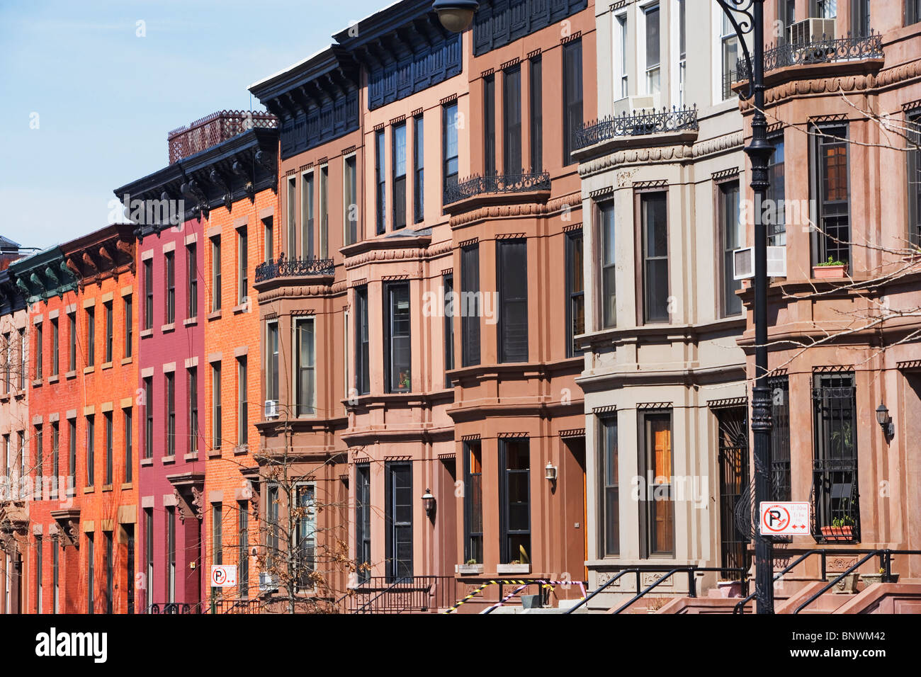 Row of brownstone townhouses Stock Photo