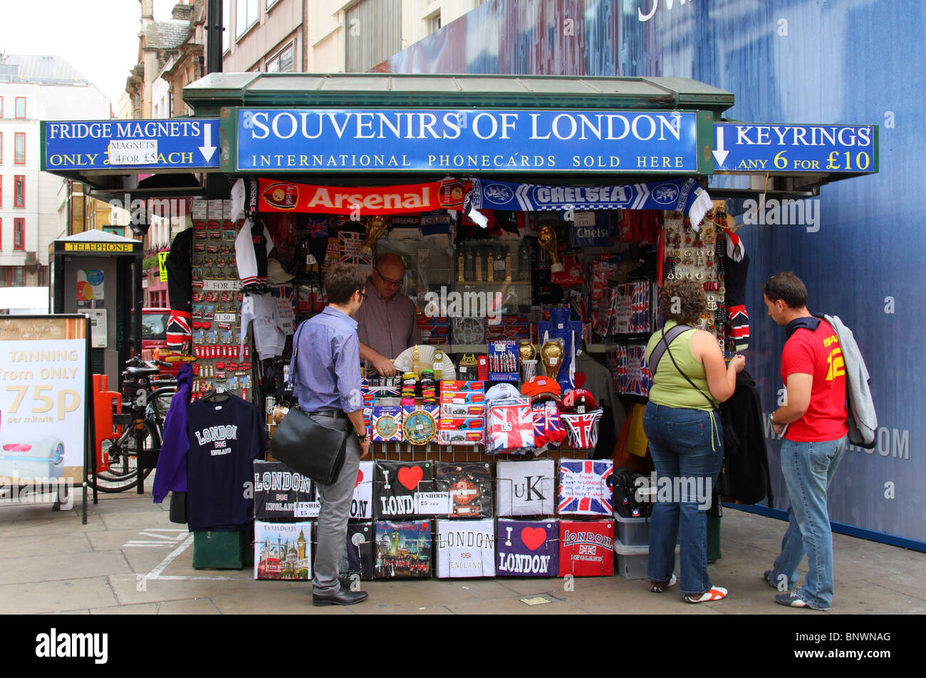 Tourists at a souvenir stall on Oxford Street, London, England, U.K. Stock Photo