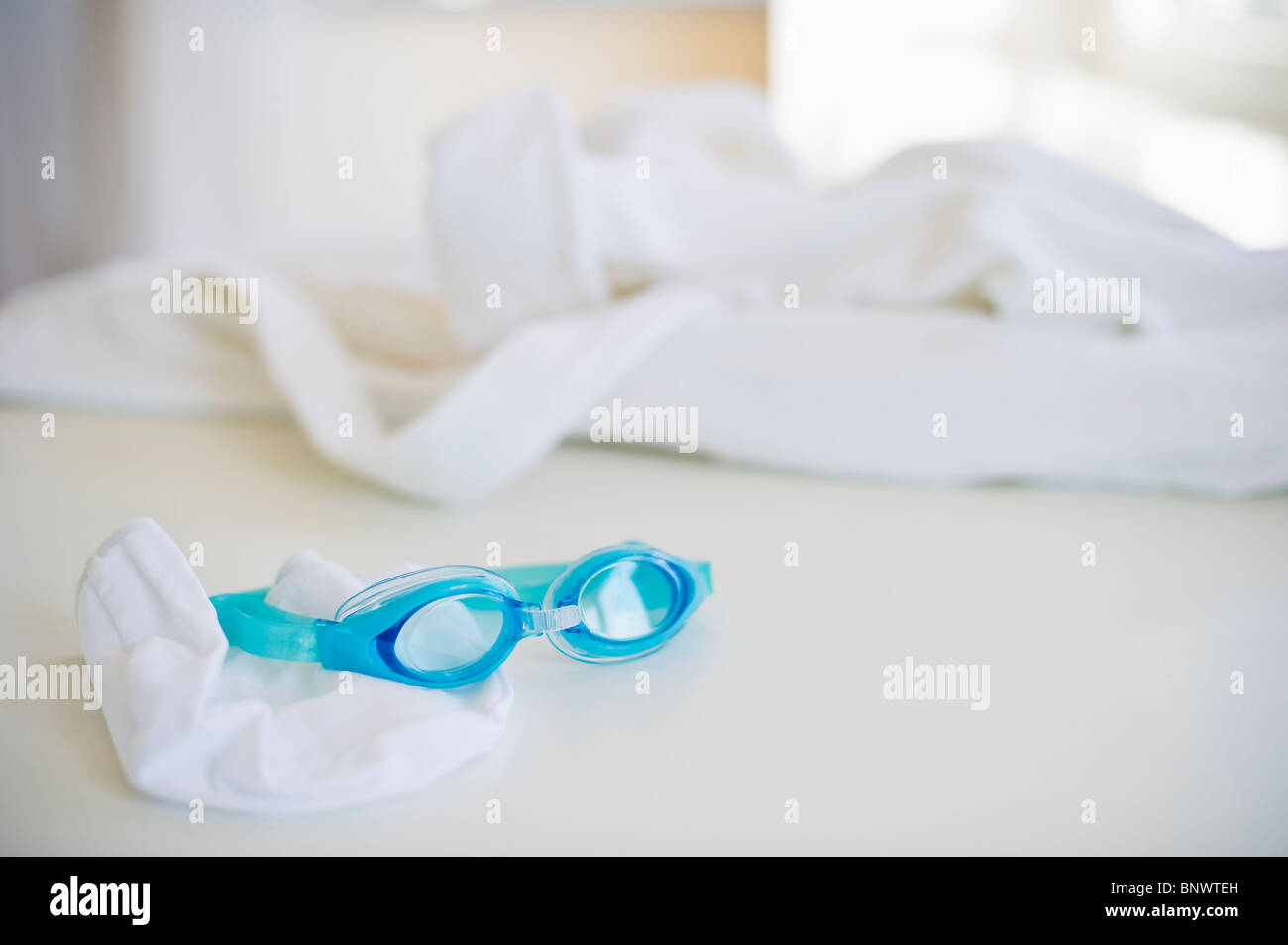 Swim cap and goggles Stock Photo