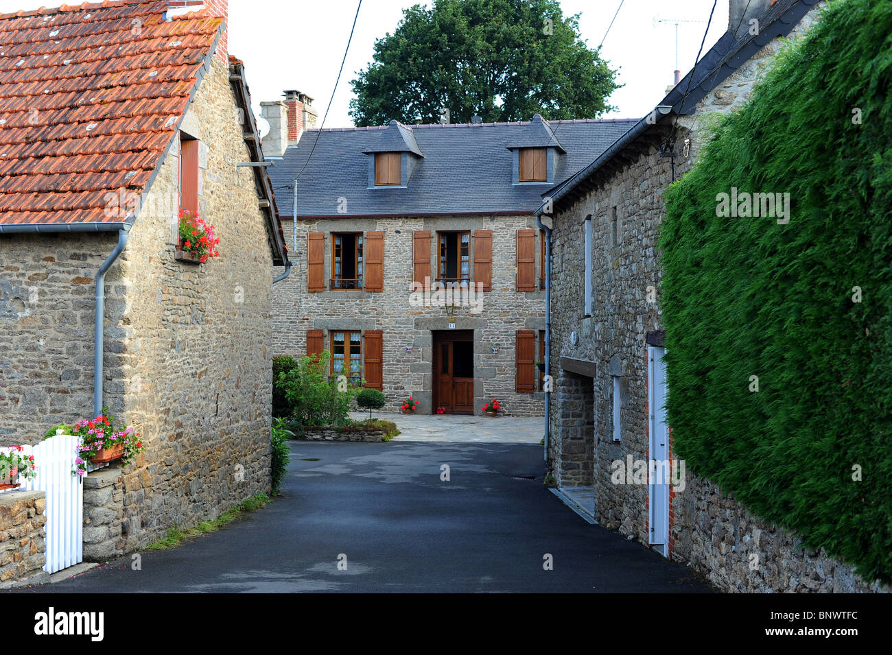 Stone cottages in quiet countryside hamlet in Brittany, France Stock