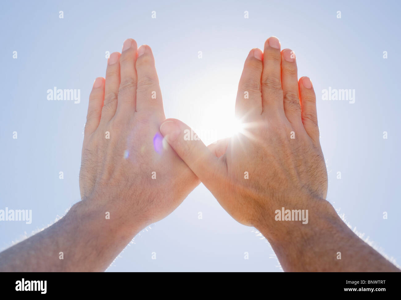 Hands framing sunshine Stock Photo Alamy