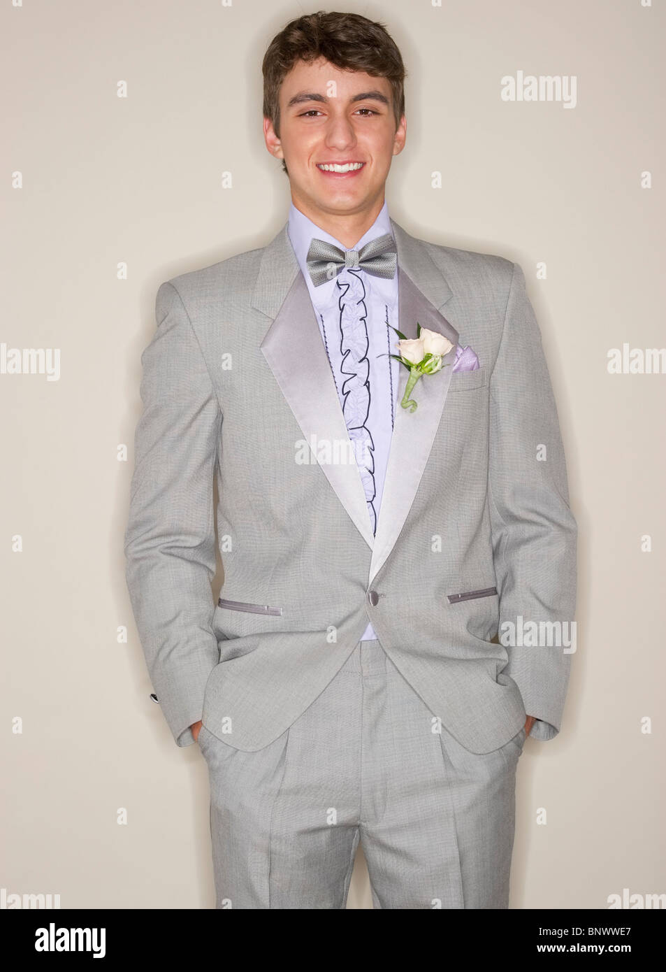 Man wearing grey tuxedo Stock Photo