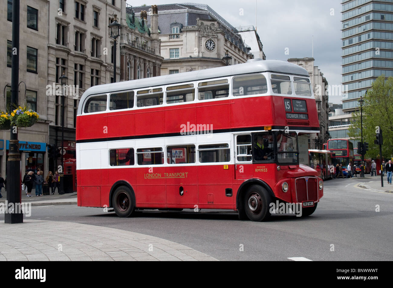 A Routemaster bus in a special livery works on the route 15 heritage route and is passing Trafalgar Square Stock Photo