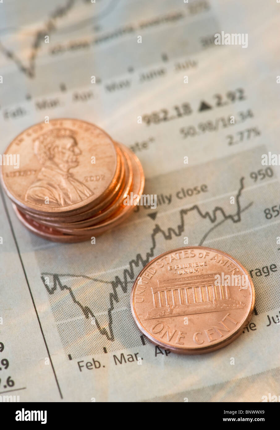 Pennies on a graph Stock Photo