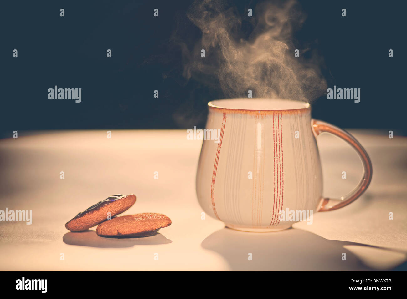 Hot tea or coffee with biscuits. Stock Photo