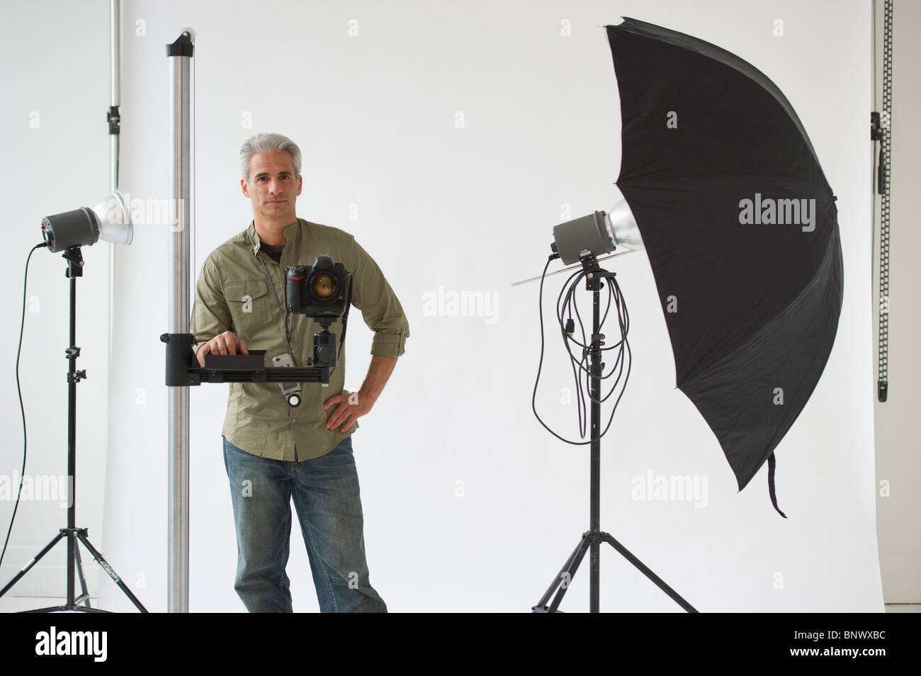 Professional photographer in his studio Stock Photo