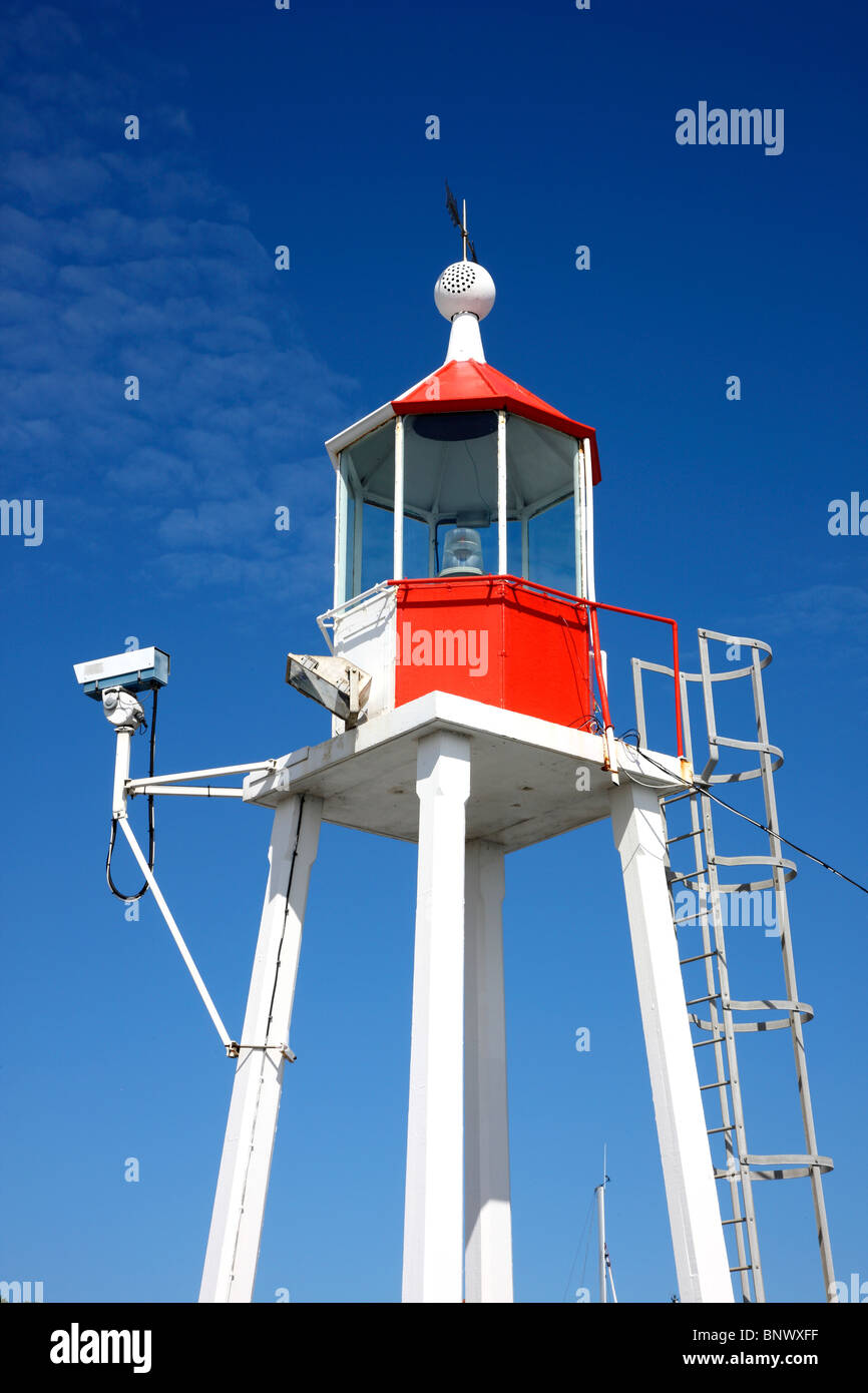 Lighthouse at the entrance of the yacht harbour of St. Peter Port, Guernsey, UK. Stock Photo