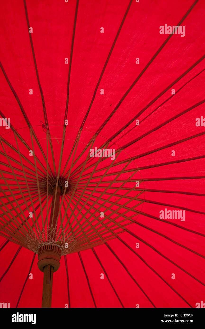 Red umbrella on the grounds of Siam Niramit, Bangkok, Thailand, Asia Stock Photo
