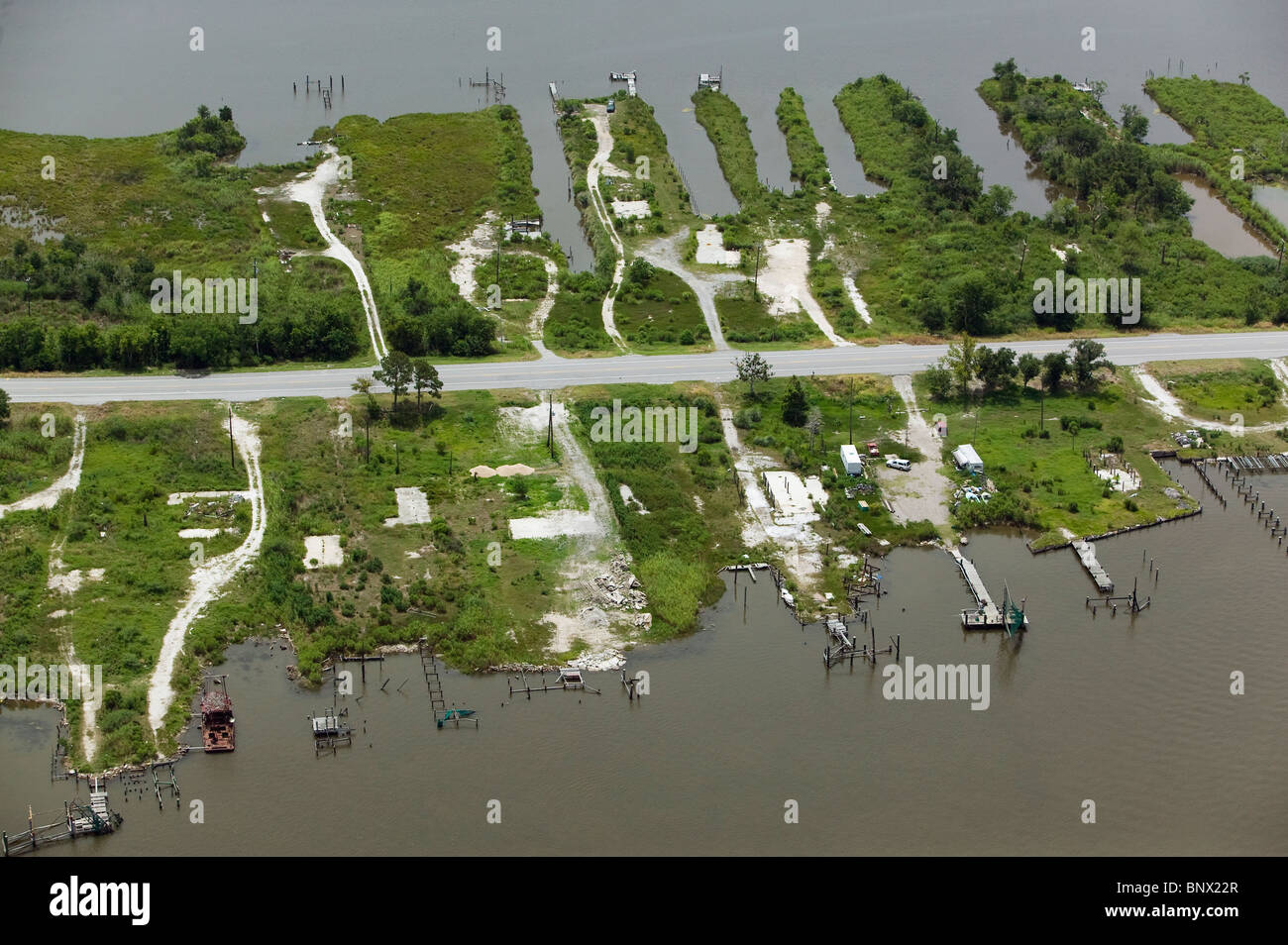 aerial view above empty pads destroyed waterfront homes hurricane Katrina New Orleans Louisiana Stock Photo