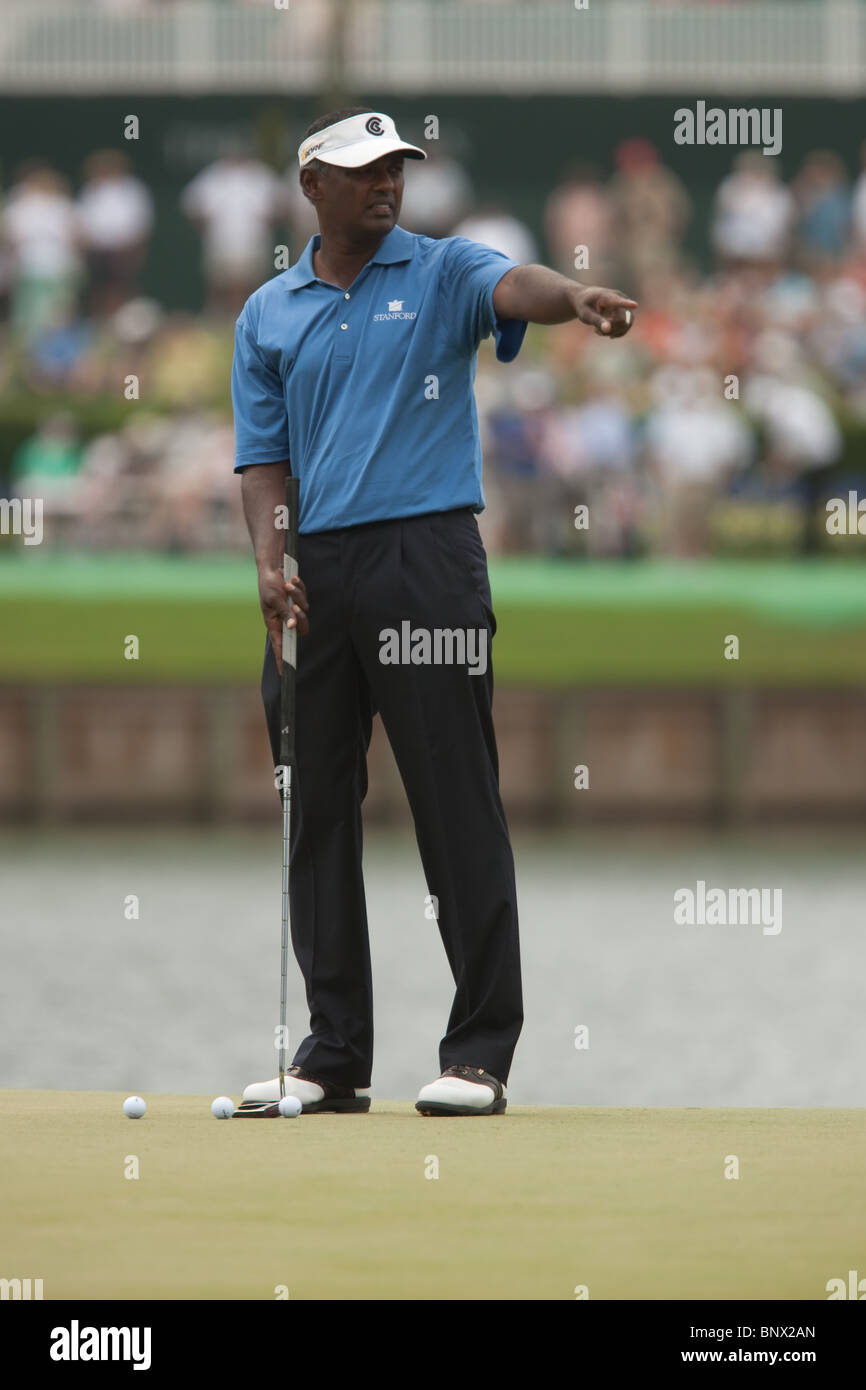 Vijay Singh putts on the 17th green during a practice round of the 2009 Players Championship. Stock Photo