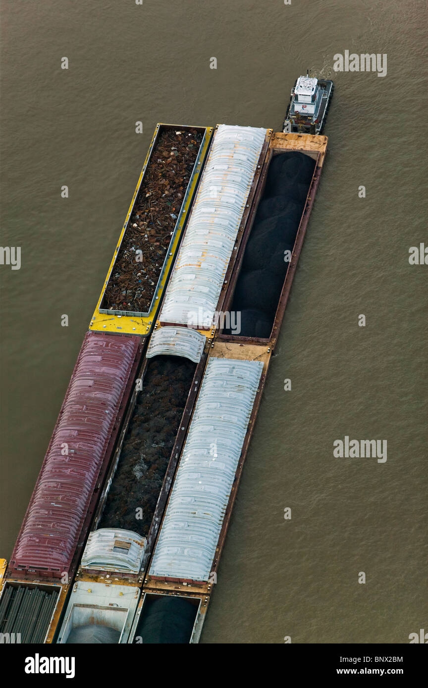 aerial view above tug boat pushing loaded barges Mississippi river Baton Rouge Louisiana Stock Photo