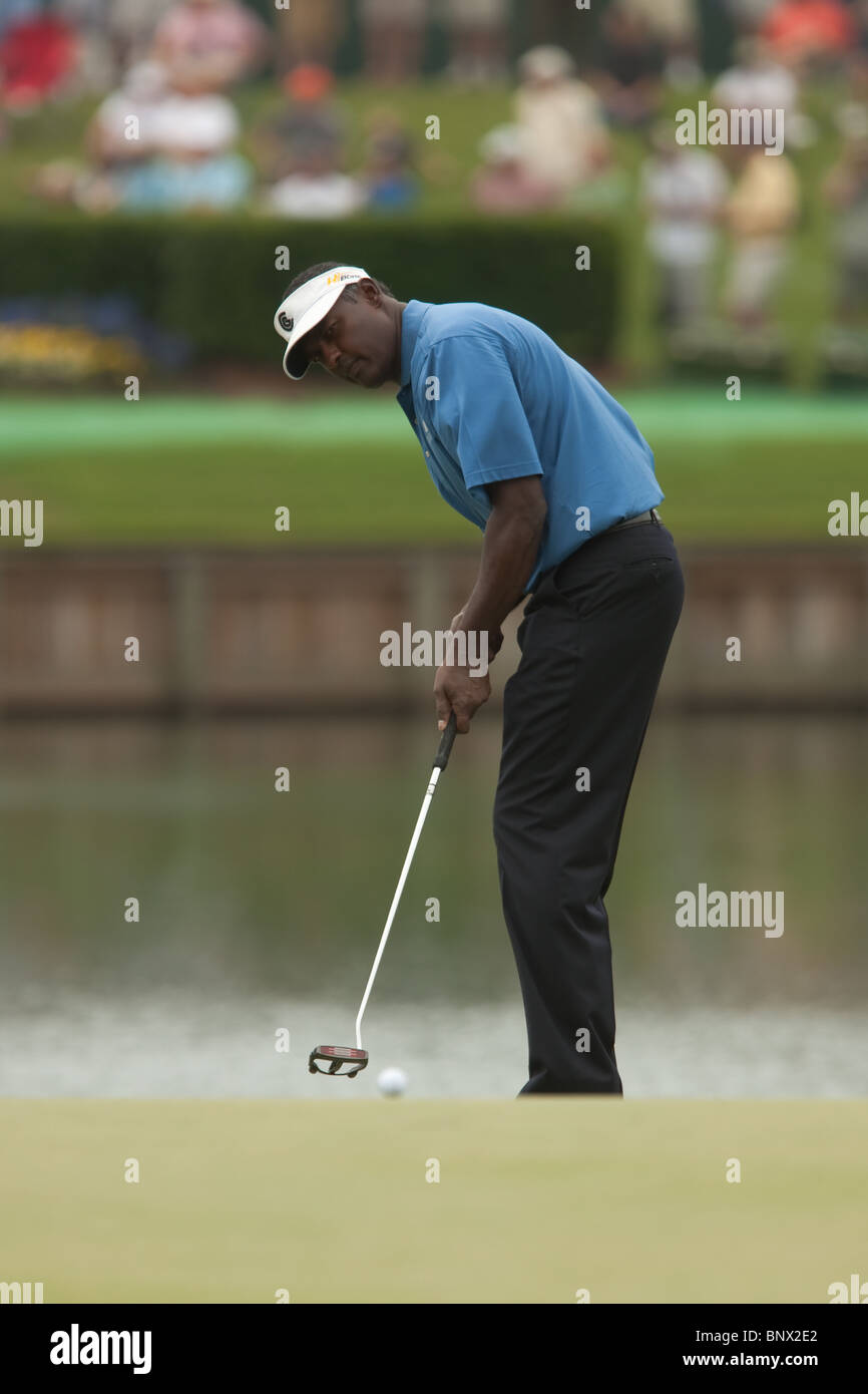 Vijay Singh putts on the 17th green during a practice round of the 2009 Players Championship. Stock Photo