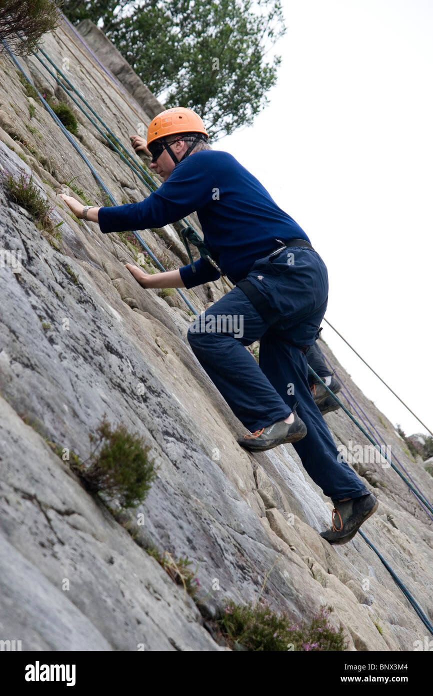 Man rock climbing barmouth slabs hires stock photography and images
