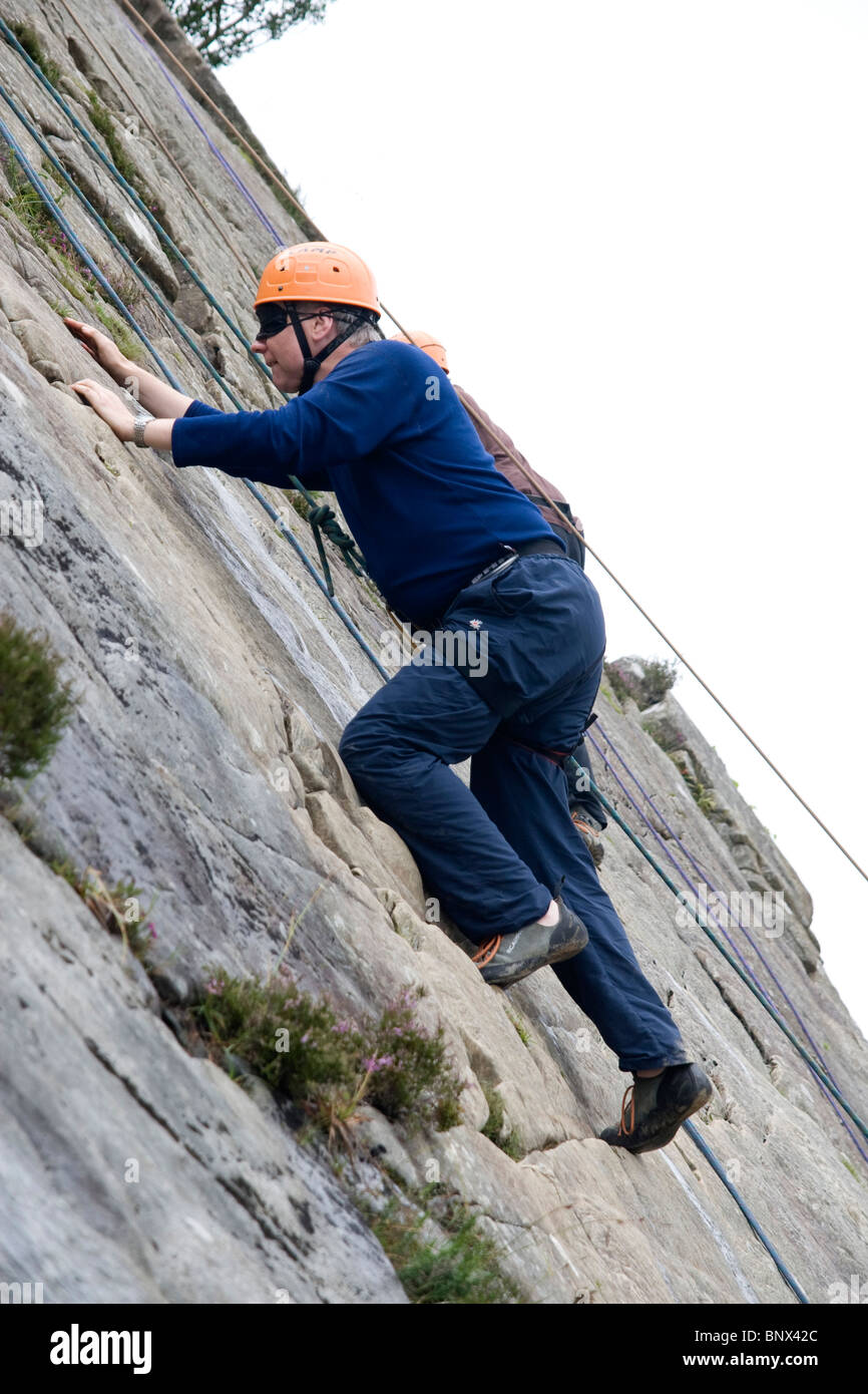 Man rock climbing barmouth slabs hires stock photography and images