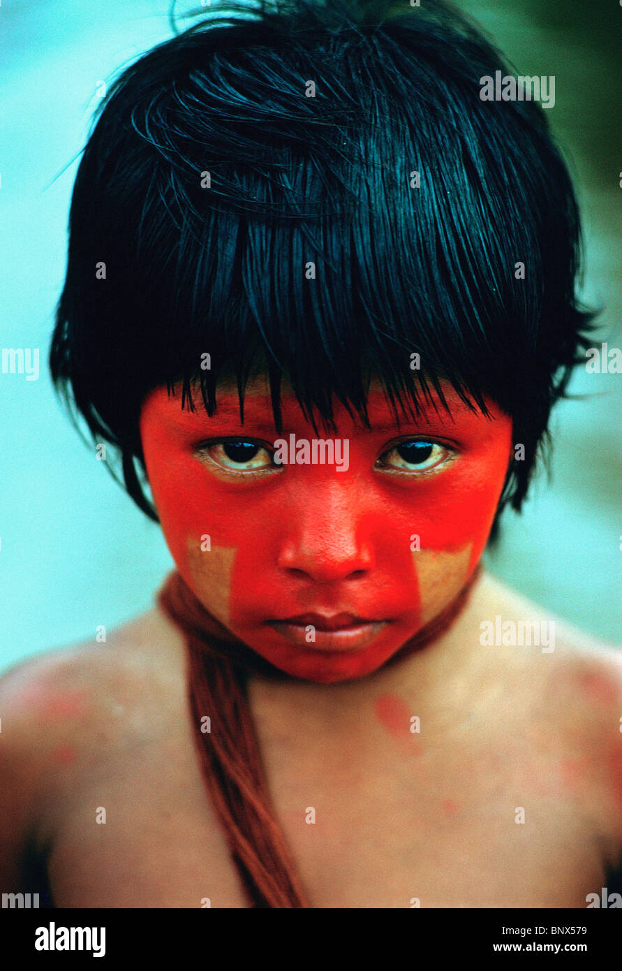 Portrait of Txukahamai tribe girl with painted face in Brazil. Stock Photo