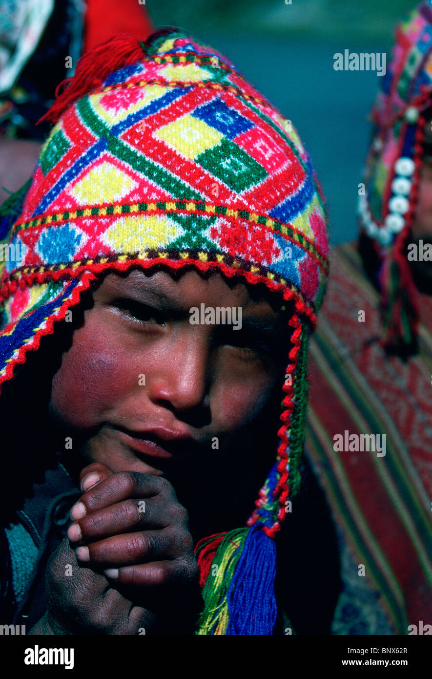 Young Andean boy wearing a chullo, a Peruvian style alpaca wool hat. Stock Photo