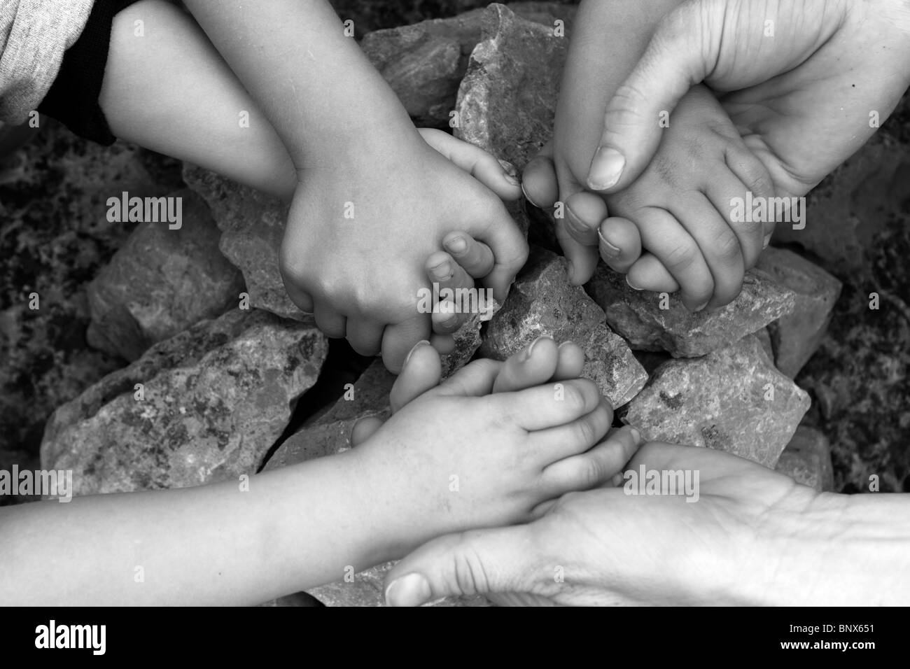 black and white kids holding hands