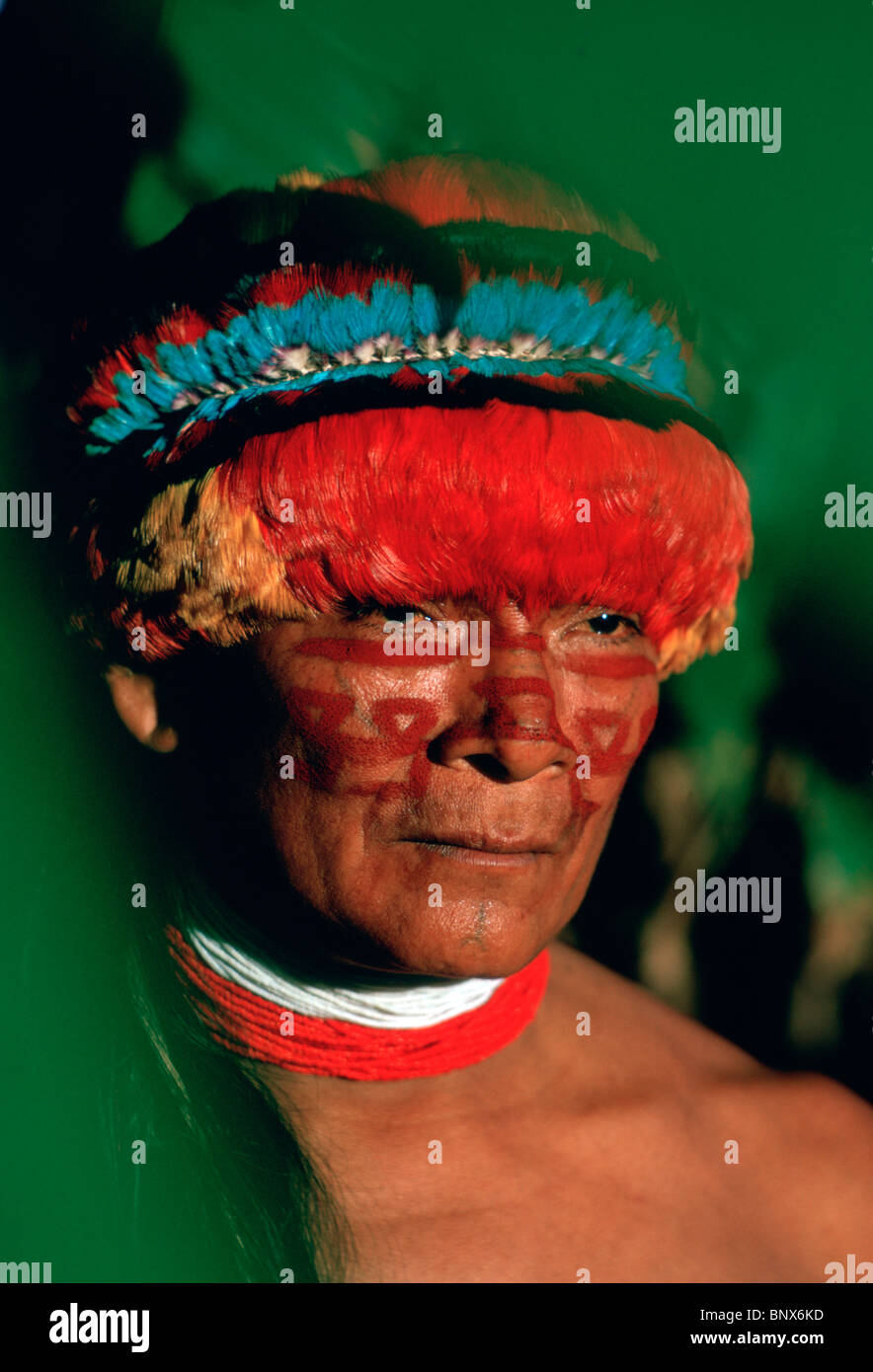 Portrait of Achual tribe chief wearing feather headdress; southern Ecuador / northern Peru Stock Photo