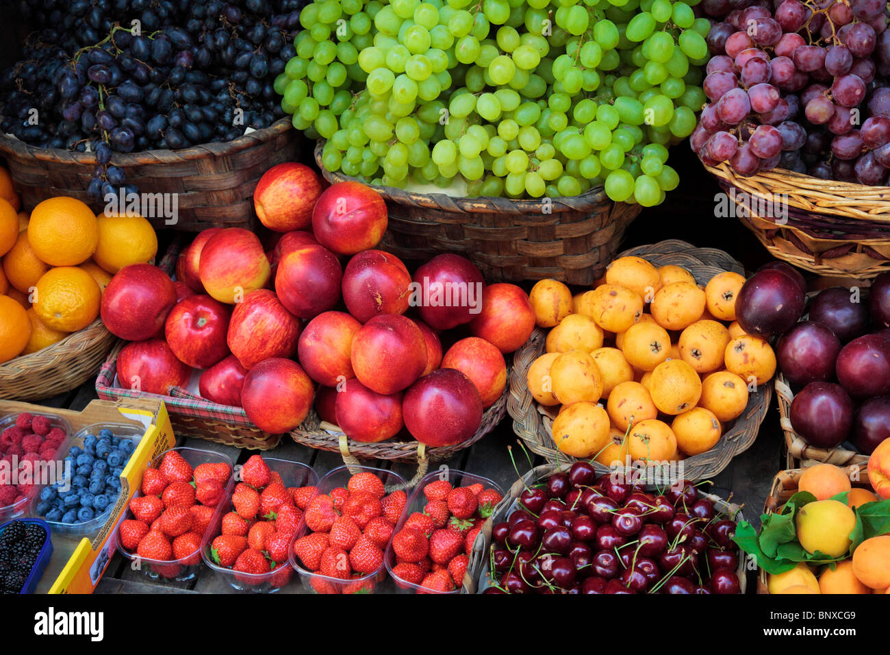Fresh fruits and berries on display in Italy Stock Photo Alamy
